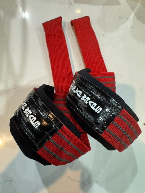 Slap Wraps V2 auto-wrapping lifting straps in Red, pair shown wrapped