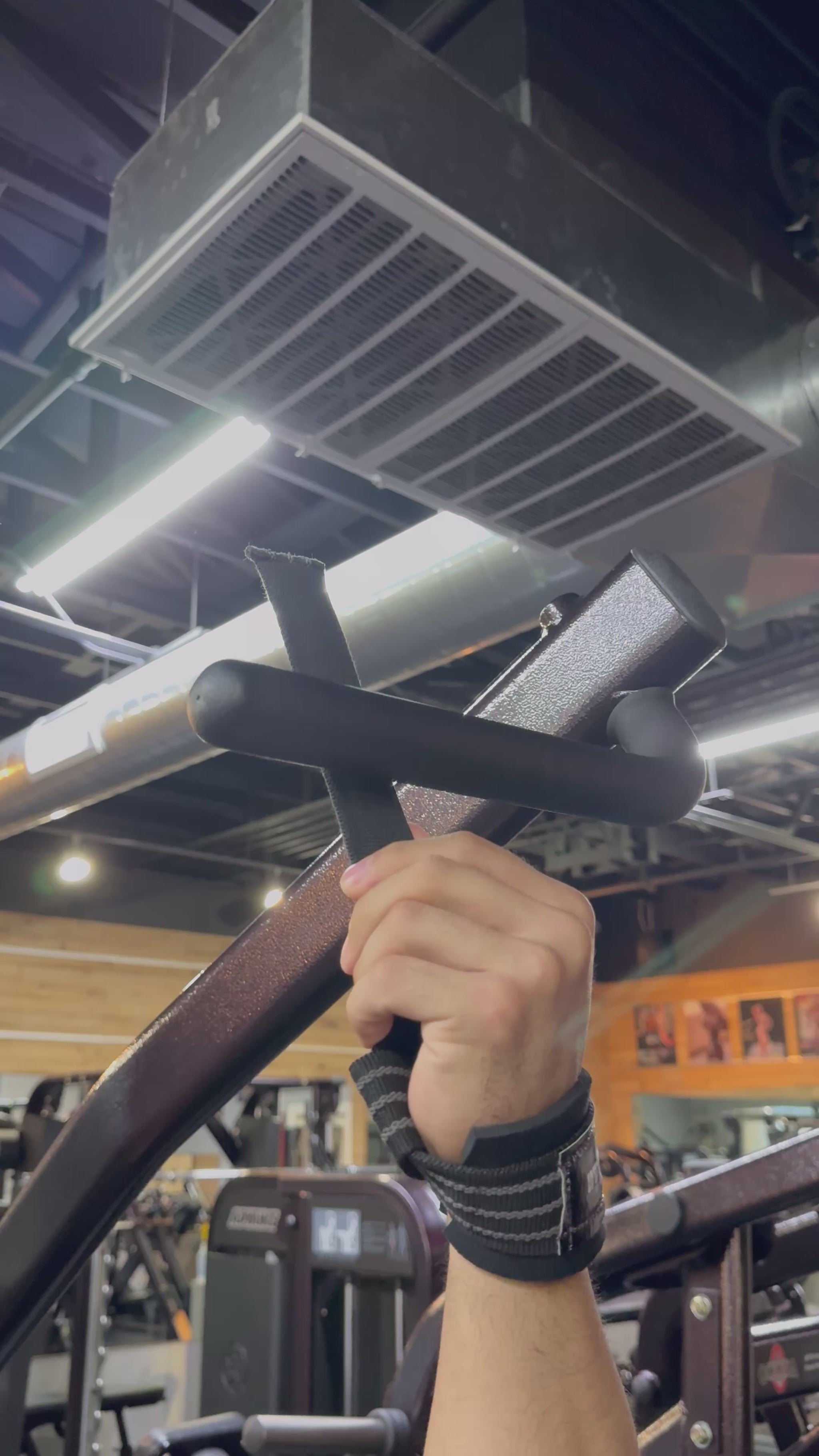 Slap Wraps V2 locking onto a pulldown handle for an instant grip